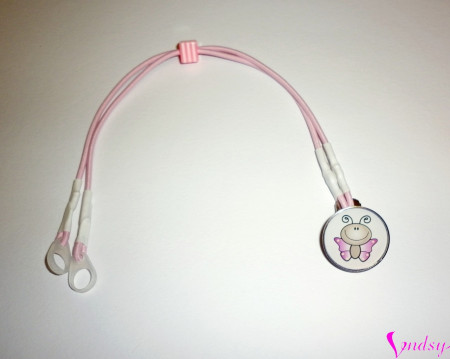 Záchytný klip fialový motýlek