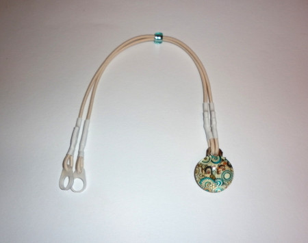 Záchytný klip béžový ornament